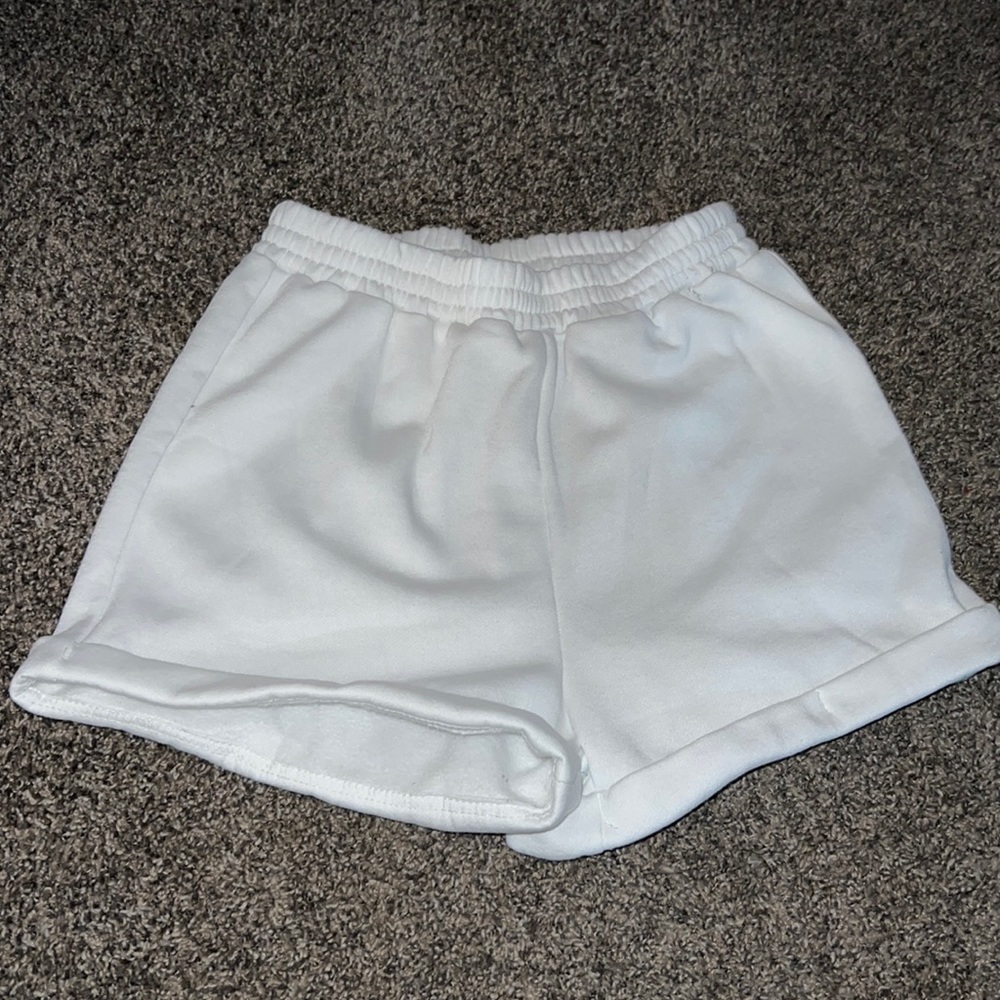white sweatpants shorts